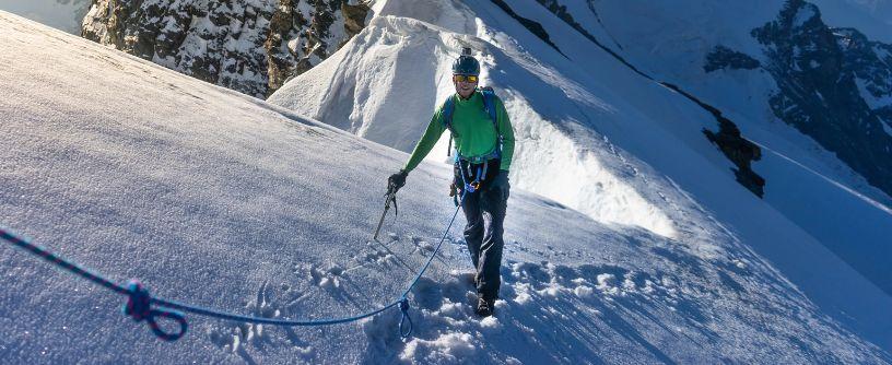 Hiking to the peak on snow